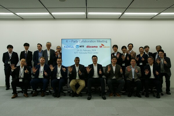 4개사 기술 관계자들이 지난 15일 일본 요코스카시 NTT R&D센터에서 진행된 기술 협력 회의에 참석했다. [SK텔레콤 제공=뉴스퀘스트]