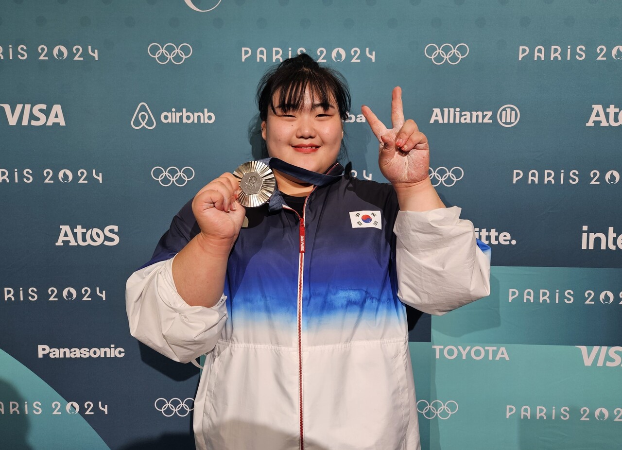 역도 박혜정 선수는 대회 마지막날인 11일 여자 81㎏ 이상급에 출전, 합산 299㎏을 들어올리며 값진 은메달을 목에 걸었다.  [SK텔레콤 제공=뉴스퀘스트]